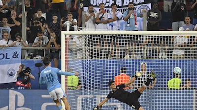 Manchester City's Jack Grealish scoring during the penalty shootout in the Super Cup match against Sevilla. AFP