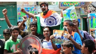 Colourfully clad Indian fans in fine voice ahead of their team's semi-final with Pakistan in Mohali today.