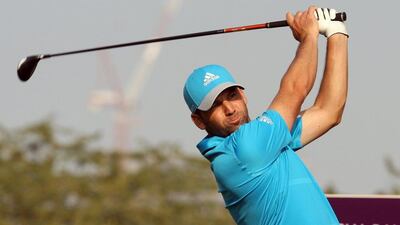 Sergio Garcia of Spain hits his shot on the 18th hole during the final round of the Qatar Masters at the Doha Golf Club in Doha on Saturday. Garcia won after he birdied the third extra hole to beat Finland's Mikko Ilonen in a playoff. Osama Faisal / AP Photo