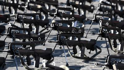 Rifles are laid out in preparation for the annual Bastille Day military parade. Joel Saget / AFP Photo