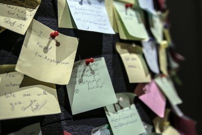 A wall filled with sticky notes is propped up at the museum’s exit. Stefanie Glinksi for The National