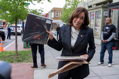 The photo of US Vice President Kamala Harris showing records she bought at Home Rule Record store has become meme fodder. EPA