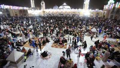 Iraqi Sunni Muslims gather for the Laylat Al Qadr – Night of Power – in the shrine of cleric Sheikh Abdel Kader Al Gilani, in central Baghdad. EPA