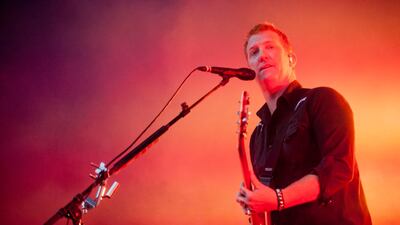 Singer Josh Homme has apologized to a female photographer he had allegedly kicked in the head during a concert in Los Angeles. EPA