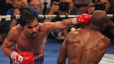Manny Pacquiao lands a left to the head of Timothy Bradley in 2012. Getty