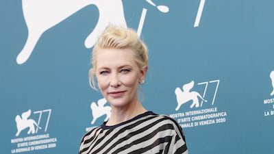 Cate Blanchett briefly removed her face mask for the photocall. Getty Images