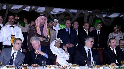 From left, former president of Mexico Ernesto Zedillo, former US president Bill Clinton, Saudi businessman Saleh Kamel, Turkish leader Recep Tayyib Erdogan and former Lebanese prime minister Rafiq Hariri attend a dinner on the sidelines of the second day of the Jeddah Economic Forum, January 18, 2004. AFP