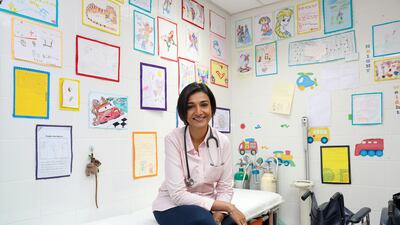 School doctor Dr Sadaf Jalil Ahmed patrols the canteen at lunchtime to offer one-to-one education in healthy eating. what children are eating. Chris Whiteoak for The National
