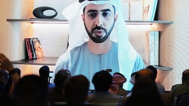 Omar Al Olama, UAE Minister for Artificial Intelligence, Digital Economy and Remote Work Applications, makes a keynote speech at the Machines Can Think in Abu Dhabi. Chris Whiteoak / The National