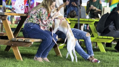 A sweet moment at Yas Pet Together.
