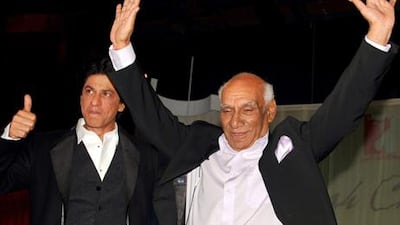 Yash Raj Chopra celebrates his 81st birthday with actor Shah Rukh Khan at a film promotion in Mumbai. AFP
