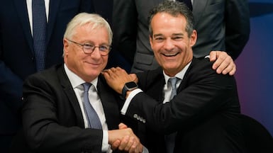 Christian Scherer, commercial aircraft chief of Airbus, left, with the Etihad Airways chief executive Antonoaldo Neves. AP