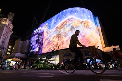 Nasa broadcasts the first images from the James Webb Space Telescope, the world's most advanced space telescope on the Piccadilly Lights screen in London, on July 12. PA Wire