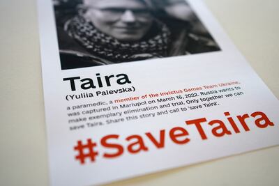 A poster for Ms Paievska after she was captured by Russian forces. PA