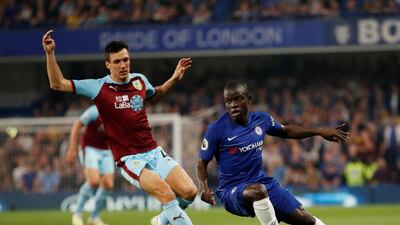 Chelsea's N'Golo Kante in action with Burnley's James Tarkowski. Kante equalised for the Blues. Reuters