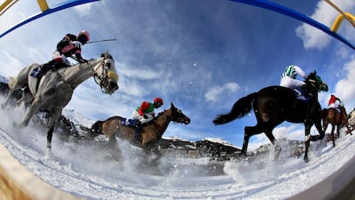 Riders and mounts race across the ice during the Sheikh Zayed bin Sultan al Nahyan cup at St. Moritz. Alexandra Wey/EPA