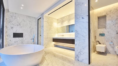 The bathroom is, of course, heavy on the marble front. Courtesy LuxuryProperty.com