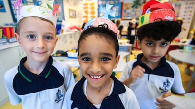 Older children learned about the history of the British monarchy while the younger pupils decorated crowns. Victor Besa / The National