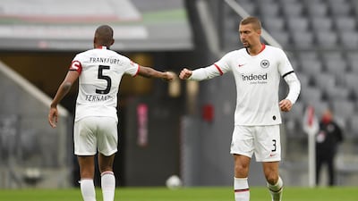Stefan Ilsanker and Gelson Fernandes of Eintracht Frankfurt celebrate their side's first goal. Getty Images