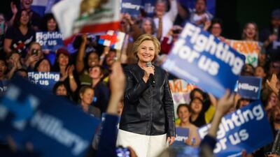 Democratic presidential candidate Hillary Clinton smiles to supporters during a rally in California. Gabrielle Lurie / AFP