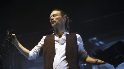 Lead singer Thom Yorke of the British band Radiohead performs on stage during a concert at the Zenith concert hall on May 24, 2016 in Paris. / AFP PHOTO / PATRICK KOVARIK