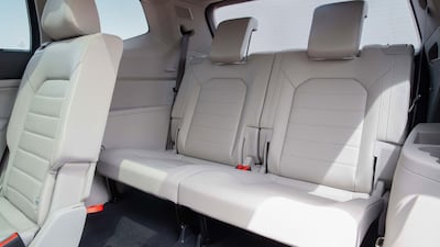 The spacious interior features seven seats in three rows. Volkswagen