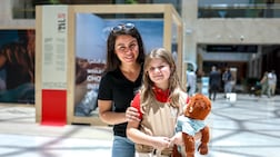 Rocio Ruiz with daughter, Sophia, eight, at the Naseej installation at Yas Mall in Abu Dhabi. Victor Besa / The National