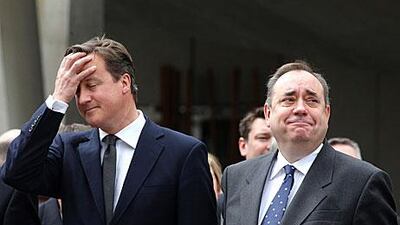Alex Salmond, the leader of the SNP, right, has accused the UK prime minister, David Cameron, of interfering in Scottish affairs.