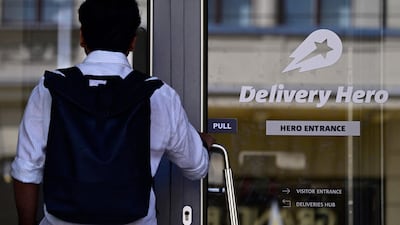 An employee enters the headquarters of German food delivery group Delivery Hero in Berlin, Germany, on July 16, 2026. The company said it has agreed to be taken over by US ride-hailing giant Uber in a 12. 7-billion-euro ($14. 6-billion) deal. Founded in 2011, the German firm now operates in over 60 markets and is one of the world's biggest food delivery groups. (Photo by John MACDOUGALL / AFP)