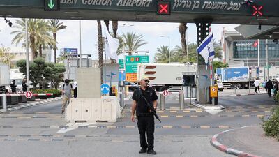 A security guard stands at the entrance of Ben Gurion Airport. Reuters
