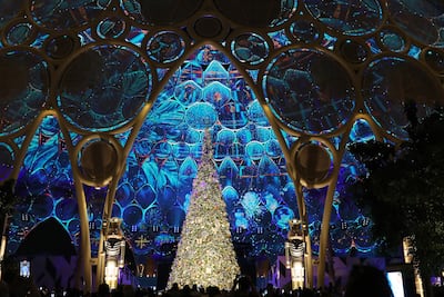 The towering Christmas tree at Al Wasl Plaza in Expo City Dubai attracts tourists again this year. Pawan Singh / The National