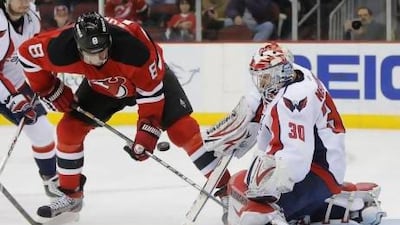 Michal Neuvirth, right, and his Washington Capitals teammates are among those teams who are off to a slow start this shortened season.
