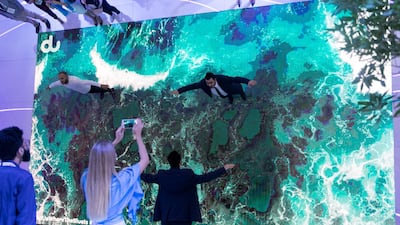 Visitors at the du booth at Gitex Technology Week. Reem Mohammed / The National