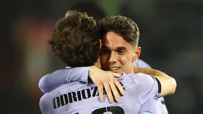 Sergio Arribas of Real Madrid celebrates with teammate Alvaro Odriozola. Getty Images