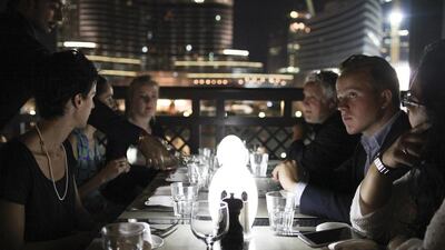 Diners stop by the Rivington Grill at Souk Al Bahar as part of the Dine Around Dubai tour. Lee Hoagland / The National