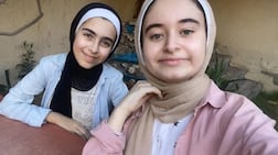 Farah Mousa, left, and her sister Tala say the blocks can be used in pavements, garden beds and partitions. Photo: The Earth Prize