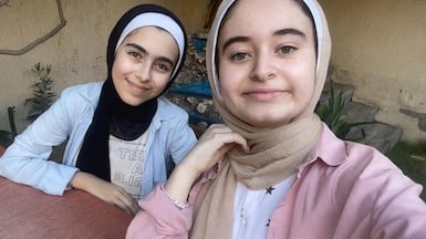 Farah Mousa, left, and her sister Tala say the blocks can be used in pavements, garden beds and partitions. Photo: The Earth Prize