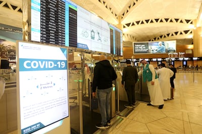 GCC citizens scan their ID cards at digital immigration gates in King Khalid International Airport, Riyadh. Reuters