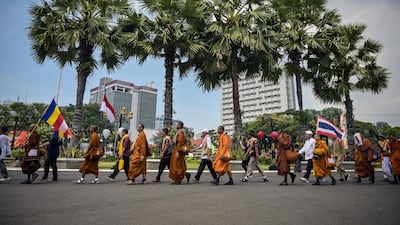 A group of Buddhist monks take part in the Walk For Peace in Surabaya, Indonesia. AFP