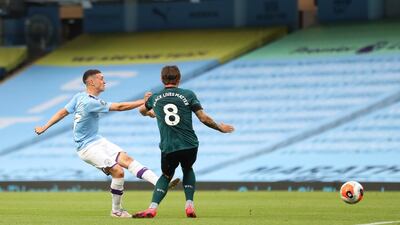 Phil Foden scores Manchester City first goal against Burnley. Getty Images