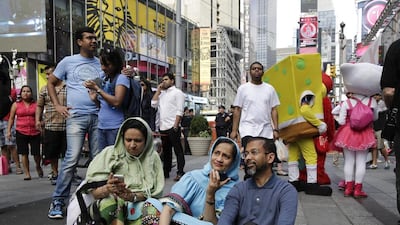 Hundreds also gathered to watch a live feed of the speech in New York’s Times Square. Julie Jacobson / AP Photo
