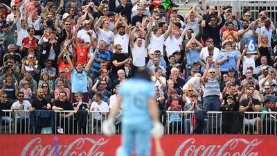 Fans cheer Eoin Morgan during the Group Stage match between England and Afghanistan at Old Trafford. Getty Images