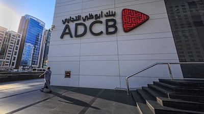 ADCB head office in Abu Dhabi. Deposits from customers in the first half of the year grew 14 per cent to nearly Dh527 billion. Victor Besa / The National