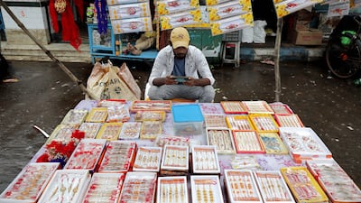 A vendor selling rakhis in Kolkata. EPA