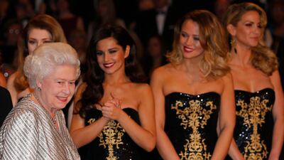 The queen meets Nicola Roberts, Cheryl Cole, Kimberley Walsh and Sarah Harding from pop group Girls Aloud. Getty