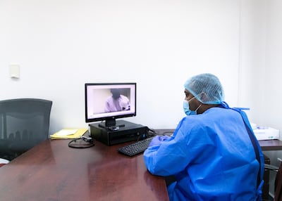 A doctor has an online follow-up appointment with an inmate at Dubai Central Prison. Reem Mohammed/The National