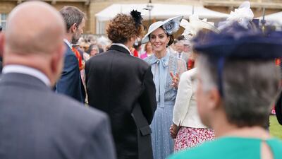 There was also a garden party at Buckingham Palace on Tuesday, with the Princess of Wales in attendance. AFP
