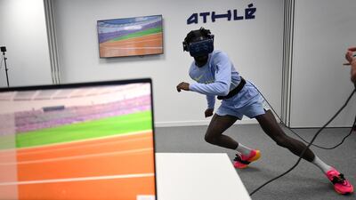 Ryan Zeze of the French 4x100 metre relay team trains with a virtual reality headset in Paris. AFP