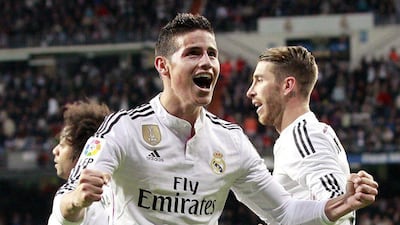 Real Madrid's James Rodriguez celebrates after scoring against Malaga in La Liga on Saturday. Ballesteros / EPA / April 18, 2015