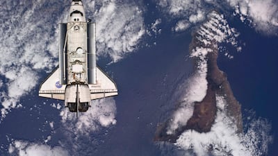 May 16 2010: The Space Shuttle Atlantis is pictured against the Earth prior to docking with the International Space Station. Reuters/NASA